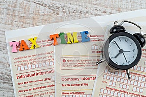 Clock with text tax timr on Australian Individual tax return form