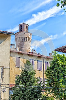 Clock tower and capenters on roof