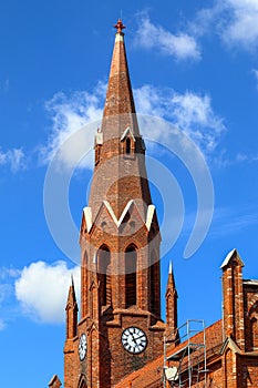 Clock tower church in Slavsk close up