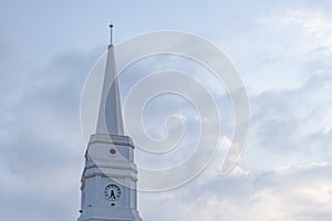 Clock tower on a cloudy sky