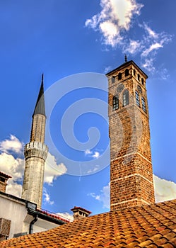 Clock tower and Gazi Husrev-beg Mosque photo