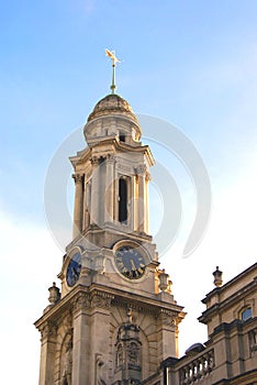 Clock tower with grasshopper sculpture, The Royal Exchange in London, England