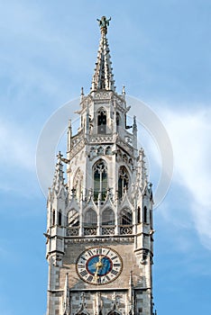 Clock tower of the new town hall building in Munich, Germany