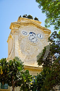 The clock tower in Prince Alfred`s Courtyard of Grandmaster`s Pa photo