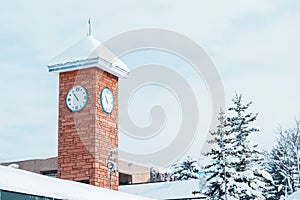 Clock tower with snow at Asahiyama Zoo in winter season. landmark and popular for tourists attractions in Asahikawa, Hokkaido,