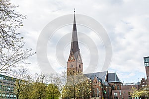 Clock tower of St. Peter`s Church in Hamburg, a Protestant cathedral since the Reformation and its congregation forms part of the