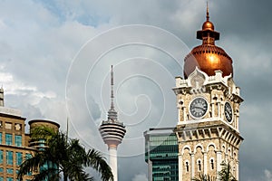 Clock tower of Sultan Abdul Samad building and Kuala Lumpur tower.