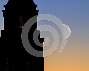 Clock Tower at Sunrise with Moon