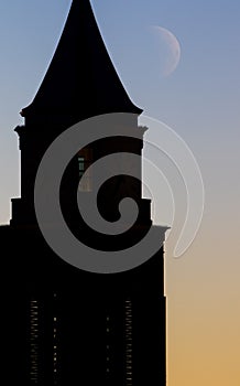 Clock Tower at Sunrise with Moon