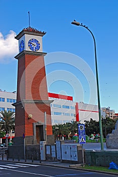 Clock tower & surrounding park & buildings outside Mercado del Puerto market hall Santa Catalina Las Palmas de Gran Canaria, Spain
