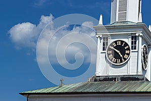 A clock tower on top of a historic building.