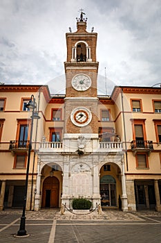 The clock tower Torre dell `Orologio in Rimini, Italy photo