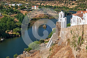 Clock tower (Torre do Relogio) on the right bank of Guadiana. Mertola. Portugal photo