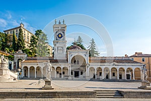 Clock tower in Udine at Liberta place