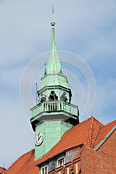 Clock-tower of the town-hall in Wrzesnia, Poland photo