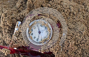 Clock Under Sand