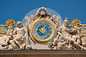 Clock at Versailles palace photo