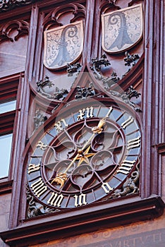 Clock on the wall, Medieval Basel Town Hall Rathaus, Switzerland