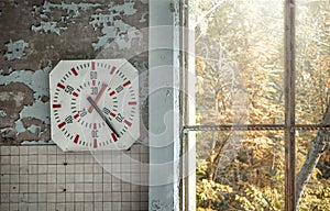 Clock and window in abandoned swimming pool `Lazurnii`