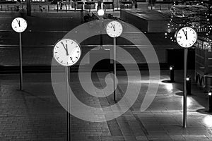 Clocks of Canary Wharf by night, London, UK