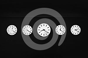 Five Clocks of Different Times