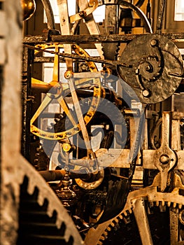 Clockwork mechanism. Close up view of cog wheels and other mechanical parts of vintage tower clock