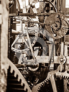 Clockwork mechanism. Close up view of cog wheels and other mechanical parts of vintage tower clock