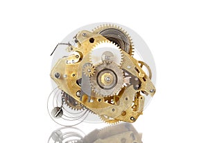 Clockworks mechanism of old vintage watch on white background wi