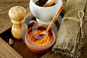 Cloe up of Colourful various herbs and spices for cooking in bowls in wooden box