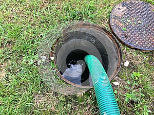 Clogged septic tank. Emptying the septic tank