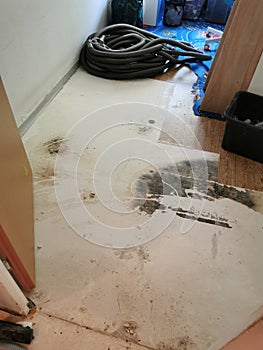 Clogged sewage drain pipe, causing a damage