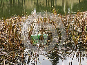 Clogging of a reservoir, a lake with plastic.