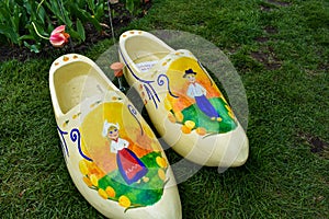 Clogs painted with Dutch People and Tulips