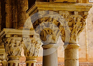 Cloister of the Benedictine monastery in the Cathedral of Monreale in Sicily. General view and details of the columns and capitals