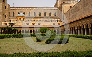 Cloister of the Benedictine monastery in the Cathedral of Monreale in Sicily. General view and details of the columns and capitals