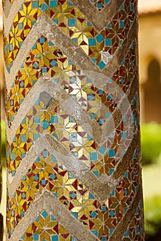 Cloister of the Benedictine monastery in the Cathedral of Monreale in Sicily. General view and details of the columns and capitals