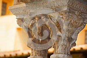 Cloister of the Benedictine monastery in the Cathedral of Monreale in Sicily. General view and details of the columns and capitals