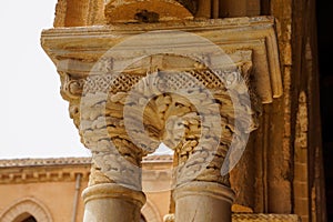 Cloister of the Benedictine monastery in the Cathedral of Monreale in Sicily. General view and details of the columns and capitals