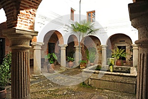 Cloister of the convent of El Palancar in Pedroso de Acim, province of Caceres, Spain photo