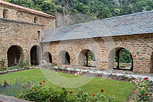 Cloister garden of the Romanesque Abbey of Saint Martin du Canigou photo