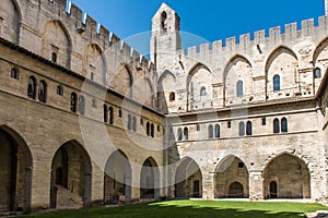 Cloisters inside the Papal Palace, Avignon, France, enclosed by battlements