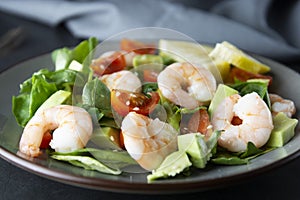 Cloos up salad with avocado and shrimps. Healthy fresh salad