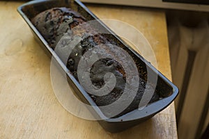 Clos up on Burned Gingerbread on wood table