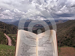 Close book and background mountain