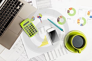 Close of business workplace with financial reports