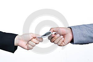 Close of businessman hands holding money