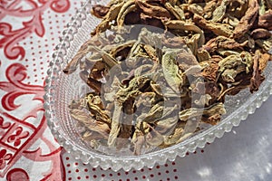 Close corner top shoot of dried string beans on tranparent plate