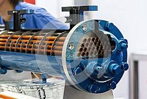 Close cross section of oil cooler core heat exchanger for cooling oil system for engine or machine in industrial photo