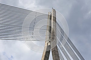 Close details of old large suspension bridge