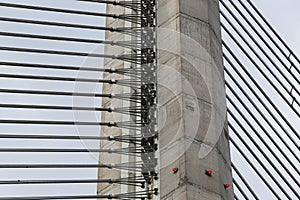 Close details of old large suspension bridge